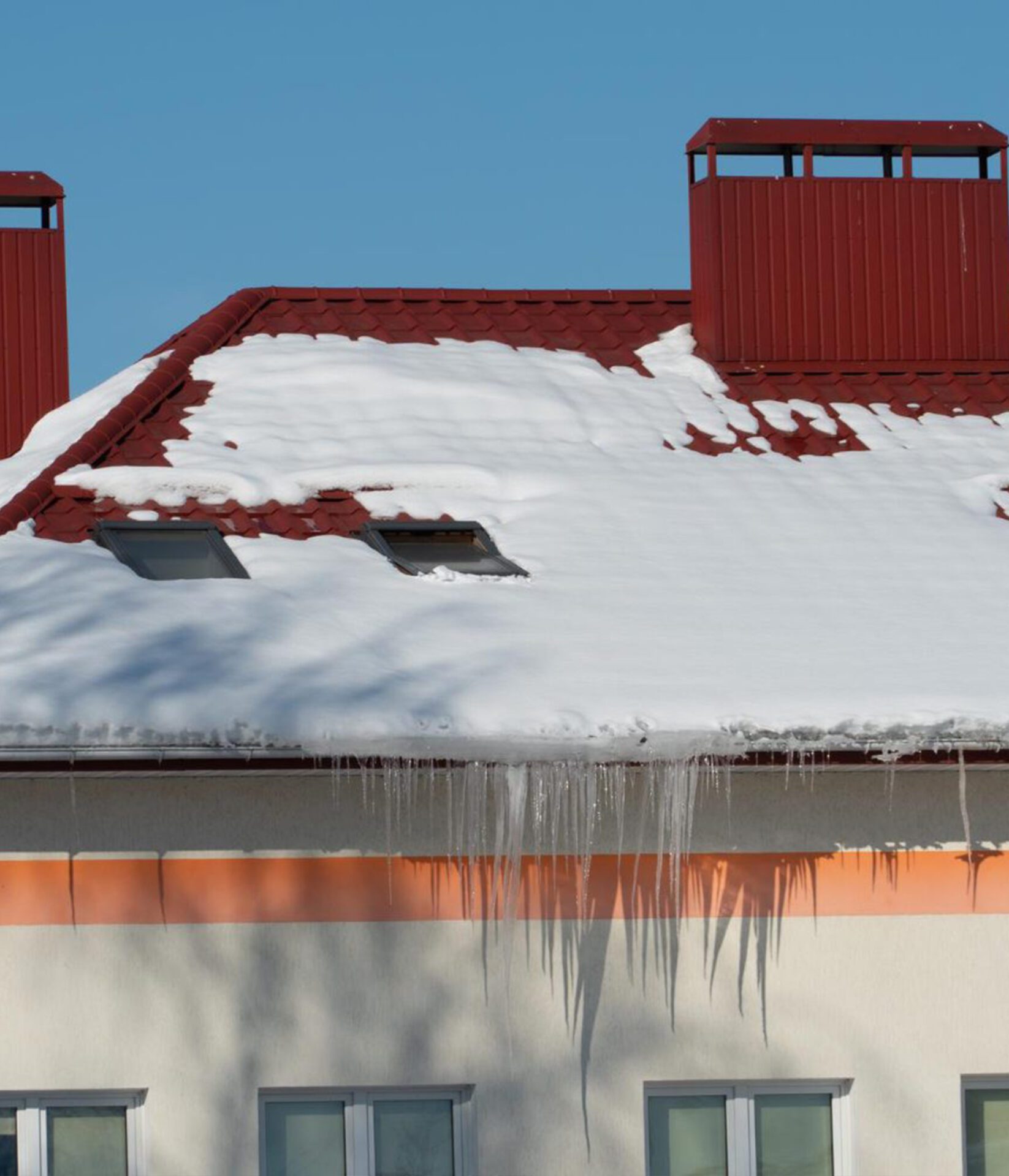 roofs-buildings-are-covered-with-snow-ice-after-big-snowfall-huge-icicles-hang-from-facades-buildings-fall-icicles-carries-danger-people-s-lives-image-scaled roofs-buildings-are-covered-with-snow-ice-after-big-snowfall-huge-icicles-hang-from-facades-buildings-fall-icicles-carries-danger-people-s-lives-image-scaled